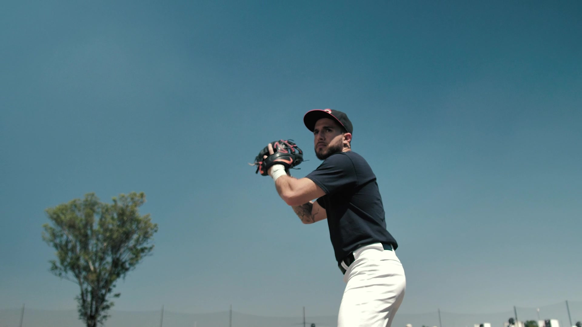 Baseball player preparing to throw on an outdoor field